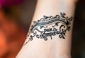 Indian style Henna tattoo for the inner wrist including word pain is temporary. tattoo idea