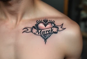 A metallic silver heart with a banner wrapped around it that reads Marek. tattoo idea