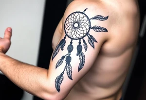 native dreamcatcher with flowing feathers and sacred beads tattoo idea