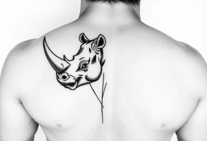 Rhino horn popping thru calf muscle tattoo idea