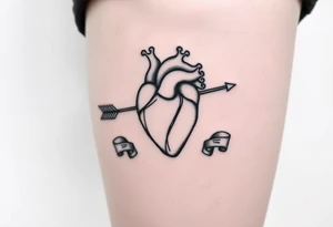 anatomical heart pierced by ornate arrow with flowing ribbons tattoo idea