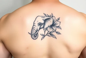 feminine elephant holding flower tattoo idea