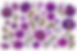 Bed of flowers in brown and purple. Small flowers and some large flowers. tattoo idea