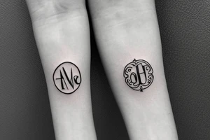 Small tattoo on the wrist with the initials AU with a halo on top tattoo idea