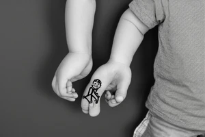 Little boy holding fathers hand tattoo idea