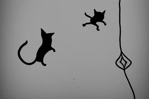A cat flying in desert on a kite tattoo idea