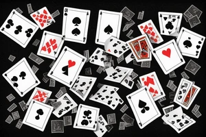 Man throwing playing cards on the table tattoo idea