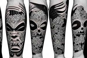 Japanese Oni mask with a crow on top surrounded by flowers tattoo idea