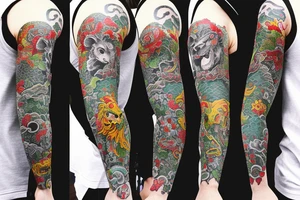 Lion on left chest and full sleeve with japanese topics with live green color tattoo idea
