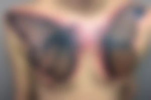 A moth with the letter G in the wings tattoo idea