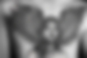 angel flying up held down by chains tattoo idea