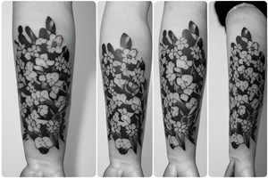 A bouquet of flowers with a lily of the valley, a rose and a poppy flower tattoo idea