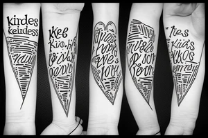 "kindness" in scripted letters tattoo idea