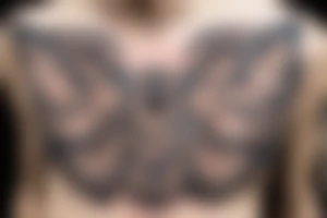Owl on chest tattoo idea