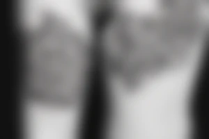 Small tatto with letters N D tattoo idea