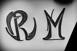 I want tattoo of alphabet M and G. tattoo idea