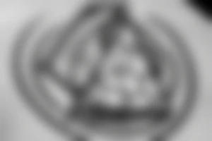 A triangle with a soccer ball inside the triangle tattoo idea