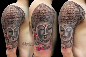 Buddha inside the tree with flower tattoo idea