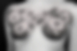 Underboob clouds with stars and flowers tattoo idea