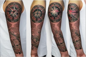 Floral half sleeve with a compass tattoo idea