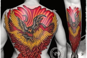 Phoenix from the ashes for my rib arch in red and yellow tattoo idea