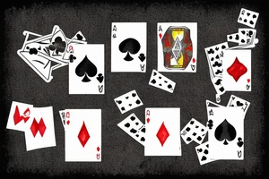 direction sign with playing cards tattoo idea