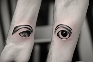 eye with angle wings simple symmetric tattoo idea