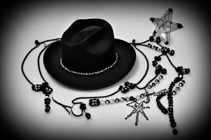 Cowboy hat with a rosary tattoo idea