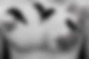 Small simple crows on chest flying tattoo idea