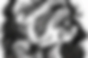 thigh tattoo, a dark woman screaming against a dark background. tattoo idea