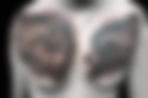 A big wolf covering the entire left chest tattoo idea