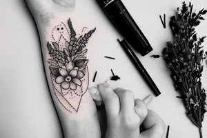 Sat down cute mole holding bouquet of twigs and herbs tattoo idea