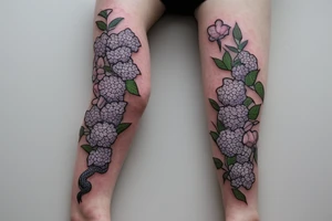 on the shin of the leg surrounded by a bed of hydrangeas and in the background of the hydrangeas there is a snake wrapping around the leg from the side of the quad to the ankle tattoo idea