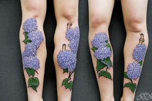 on the shin of the leg surrounded by a bed of hydrangeas and in the background of the hydrangeas there is a snake wrapping around the leg from the side of the quad to the ankle tattoo idea