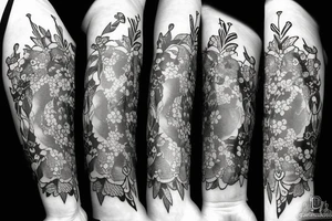 4 flowers one sword with two folks tattoo idea