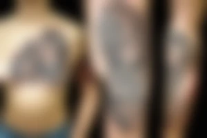 blond Hispanic female warrior with Aztec artwork behind her tattoo idea