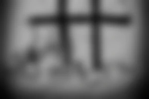 A Christian cross with a torn flag behind it. tattoo idea
