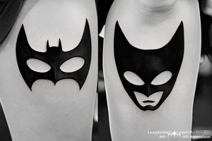 Black batman logo above knee tattoo idea