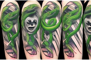a clown being strangled by an unnaturally large green snake with silver stripes tattoo idea