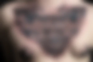 Owl on the chest tattoo idea