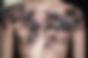 Flowers on chest tattoo idea
