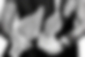 man in suit holding a martini glass tattoo idea