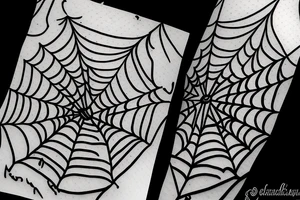 spiderweb with letter N tattoo idea