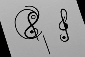 A treble clef that incorporates a base clef and a semicolon tattoo idea
