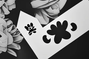 lotto flower with a disguised letter N - very minimalistic - the Om can be added as well tattoo idea