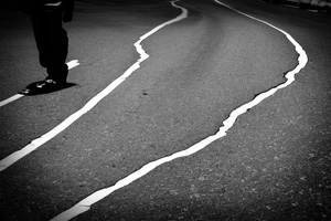 cracked road in the mountains tattoo idea