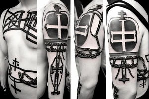 Mountains and clouds shaded and faded with 3 crosses at the top with chains going around the arm tattoo idea