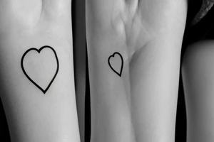 Simple 1/2” inche fine line silhouette small eye inside heart minimalist tattoo idea