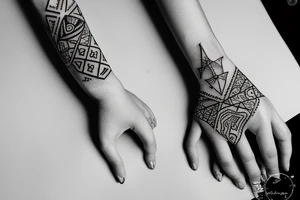 sketch of a tattoo, a small baby’s  hand holds mom's finger tattoo idea