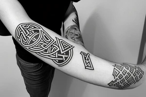 solid armband with Norse symbols tattoo idea